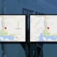 Two small map thumbnails side by side showing a red location pin near Alder Lake Park and New Reliance. Background blurs a police vehicle badge.
