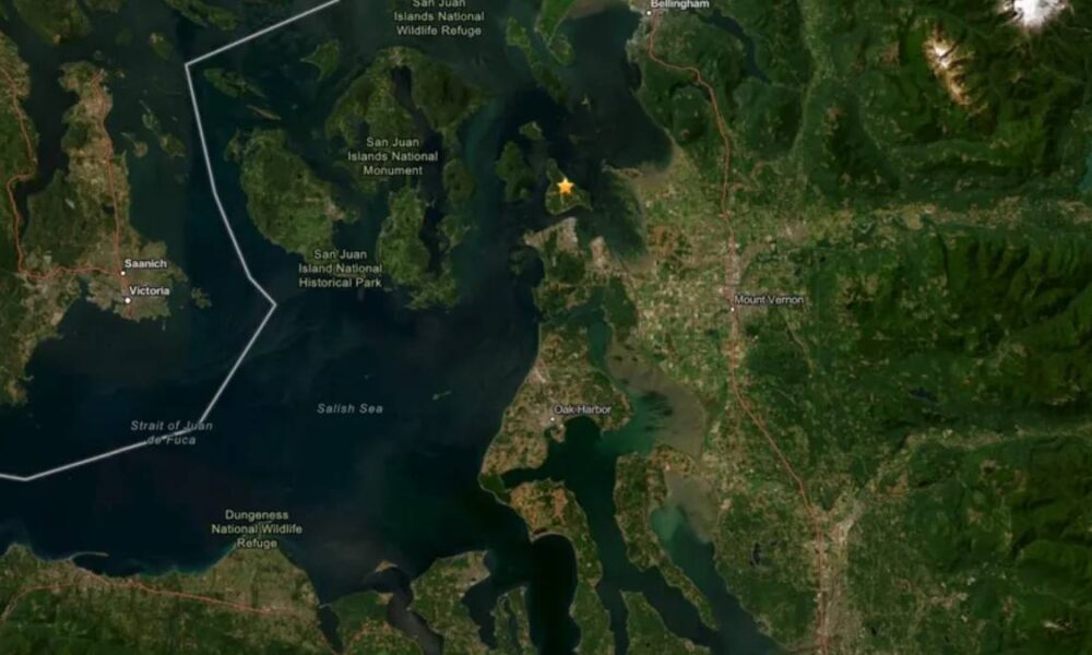 Satellite map of Puget Sound region showing the San Juan Islands, nearby wildlife refuges, and a star marker indicating a point of interest near the islands.