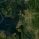 Satellite map of Puget Sound region showing the San Juan Islands, nearby wildlife refuges, and a star marker indicating a point of interest near the islands.