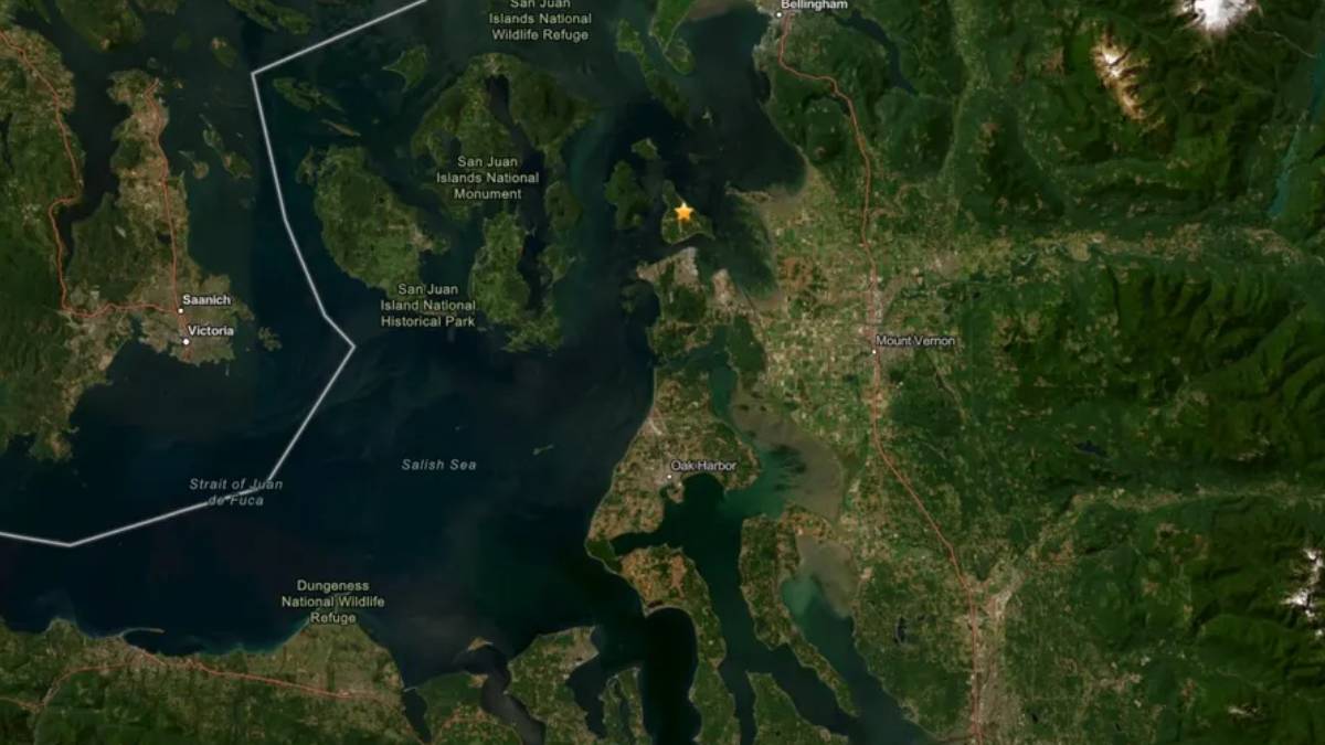 Satellite map of Puget Sound region showing the San Juan Islands, nearby wildlife refuges, and a star marker indicating a point of interest near the islands.