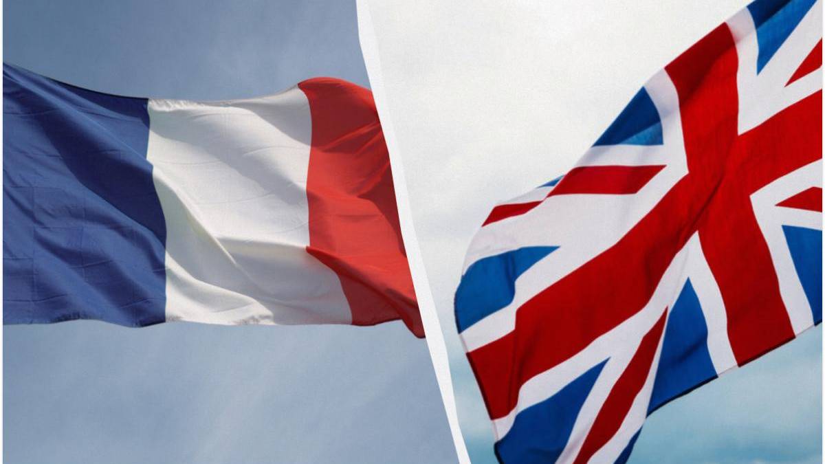 French flag and UK flag fluttering in the wind, separated by a white seam. (informative)