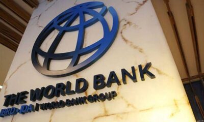 World Bank logo on marble wall with globe emblem and bold black lettering that reads The World Bank Group