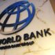 World Bank logo on marble wall with globe emblem and bold black lettering that reads The World Bank Group