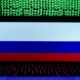 Laptop displaying the Russian flag on screen, with green binary code streaming above.