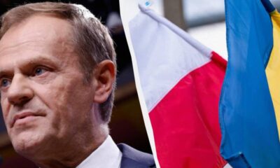 Close-up of a man in a suit speaking, with a split view showing French and Ukrainian flags on the right edge.