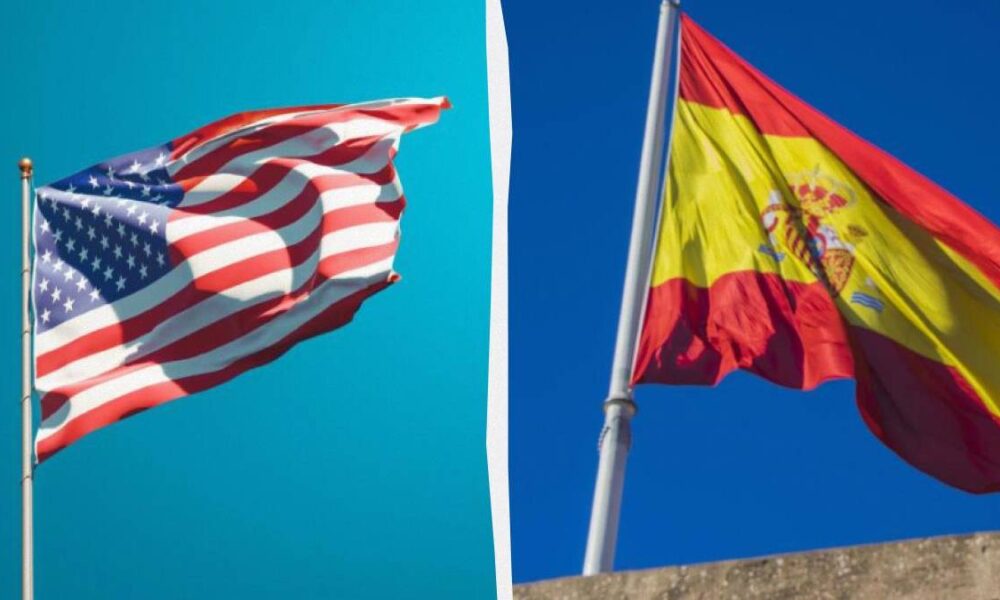 Split image showing the American flag on the left and the Spanish flag on the right against blue skies, separated by a white divider.