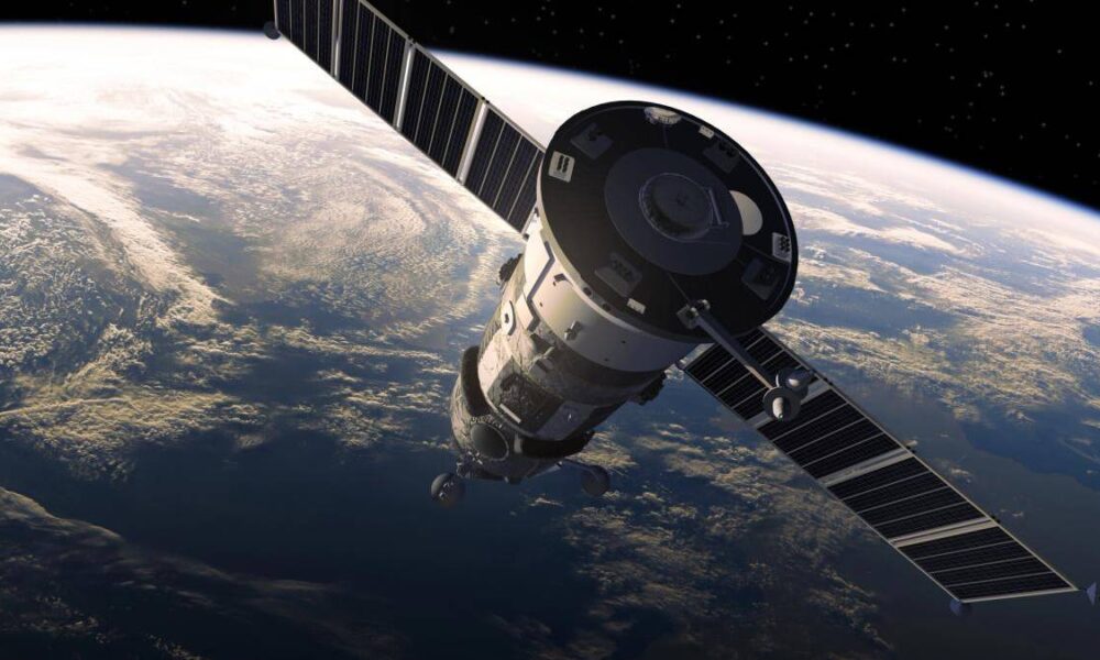 Satellite in orbit around Earth with extended solar panels above the planet's curvature and dark space background.