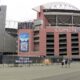 Lumen Field exterior with a tall tiered clock tower and banners advertising the FIFA Club World Cup 2025 outside the stadium