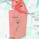 Map with red outlined outage zones centered on Alderton and extending toward Bonney Lake and McMullen, with lightning icons indicating outages.