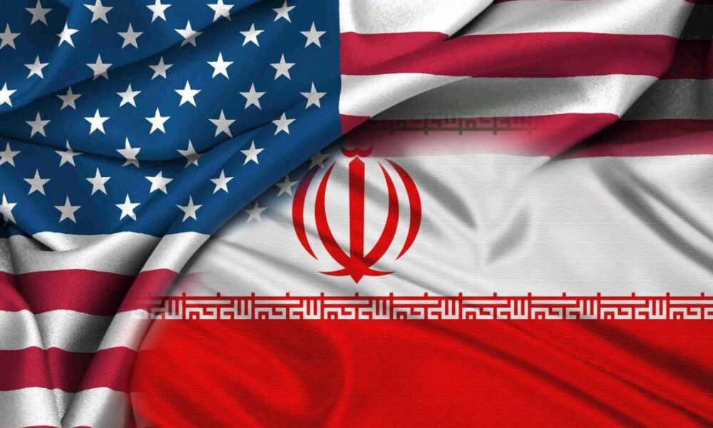 Composite image blending the United States flag with the Iranian flag, implying U.S.–Iran relations.