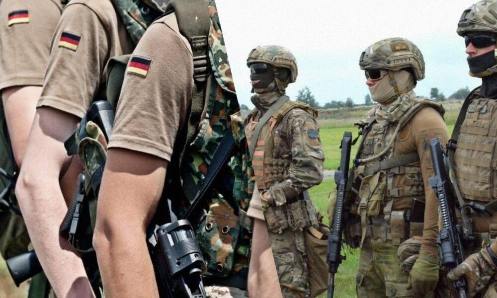 Group of soldiers in combat gear standing in a field, each carrying rifles and wearing camouflage uniforms.