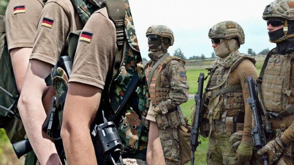 Group of soldiers in combat gear standing in a field, each carrying rifles and wearing camouflage uniforms.