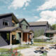 Row of modern townhouses with a shared outdoor seating area and residents gardening and walking nearby.