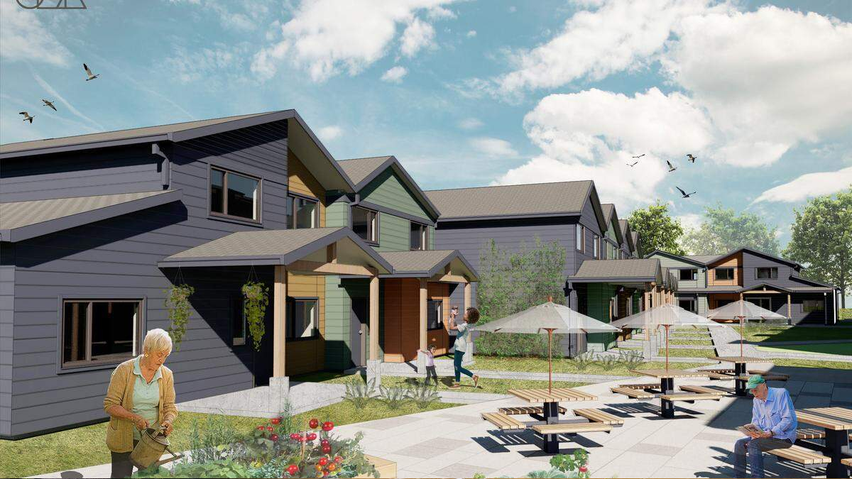 Row of modern townhouses with a shared outdoor seating area and residents gardening and walking nearby.