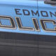 Blue police car with 'EDMONDS POLICE' lettering on the side and a KOMO News watermark in the lower-right corner.