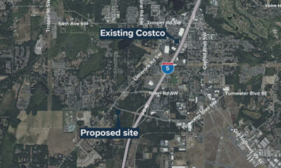 Aerial map showing an existing Costco near Interstate 5, with a proposed site to the southwest along I-5 near Israel Rd SW.
