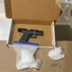 Semi-automatic pistol in an open cardboard evidence box, surrounded by bags of white powder and a small vial, with a handwritten weight (168.9 g) on the table and a sheriff emblem in the background.