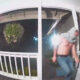 Nighttime porch security footage: a man in jeans and a hoodie runs away from the doorway on a covered porch.