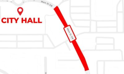 Map snippet showing a red route along Main St SW toward City Hall, with a location pin and bold City Hall label on the left.