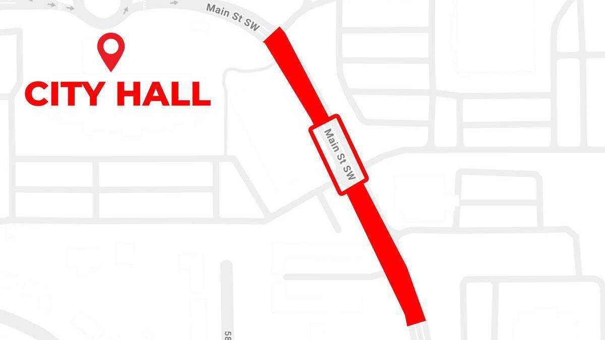 Map snippet showing a red route along Main St SW toward City Hall, with a location pin and bold City Hall label on the left.