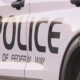 Side view of a white police SUV with large 'POLICE' lettering and 'City of Federal Way' on the door.
