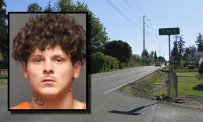 Mugshot of a young man with curly hair and a neck tattoo, overlaid on a suburban street scene.
