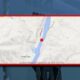 Map showing a river with a red location pin on the river crossing, likely marking a point of interest or incident location.
