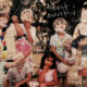 Group of kids in a park posing for a photo with handwritten chalk text overlay across the image.
