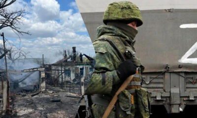 Soldier in camouflage gear with a rifle beside a gray train car as a destroyed village burns on the left (split image).