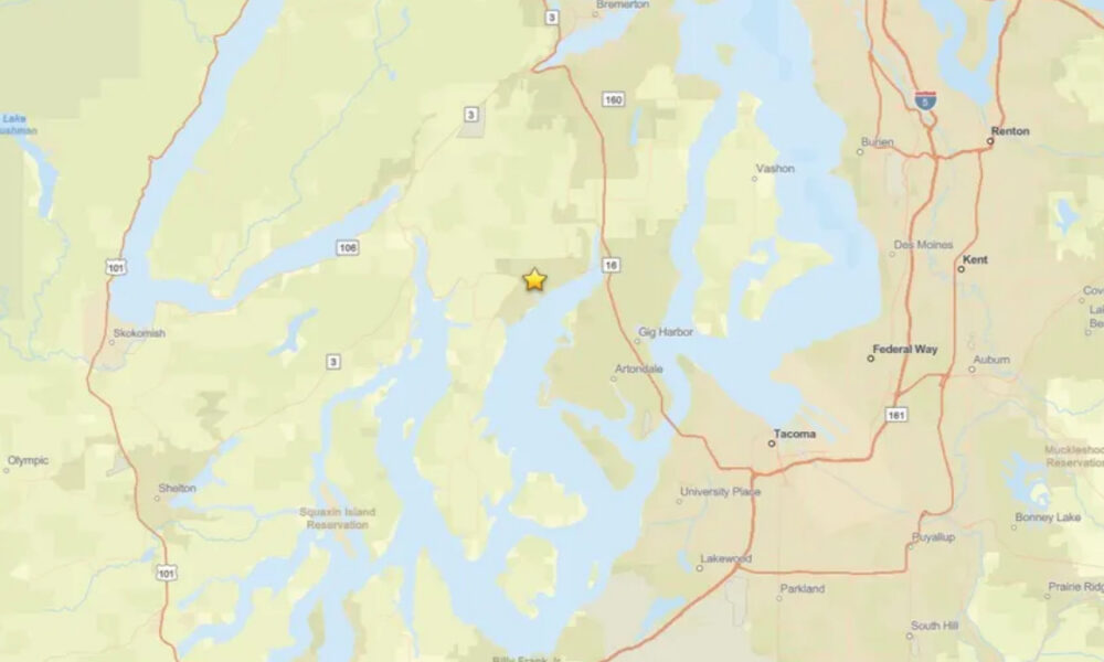 Map with a yellow star marking a location near Gig Harbor, Washington, amid Puget Sound waters and highways.