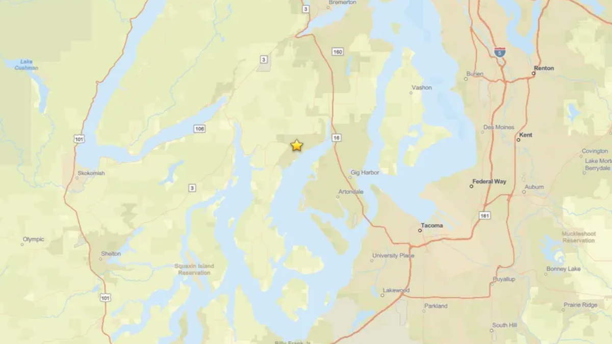 Map with a yellow star marking a location near Gig Harbor, Washington, amid Puget Sound waters and highways.