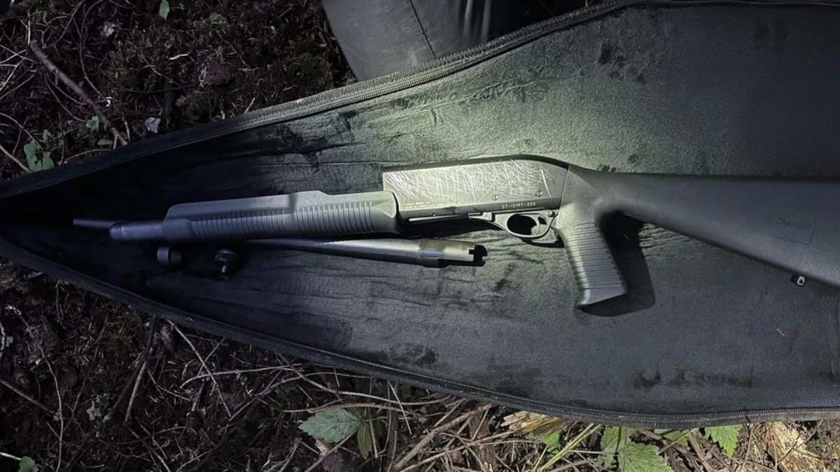 Disassembled shotgun in a padded case, with barrel, receiver, and stock laid out for transport.