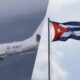 Split image: left shows a U.S. Navy aircraft in flight; right shows a Cuban flag waving on a flagpole against a blue sky.