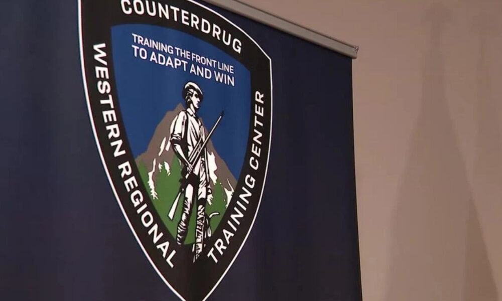 Banner showing the Counterdrug Western Regional Training Center emblem with a front-line worker holding a rifle, mountains in the background, and motto “Training the front line to adapt and win.”