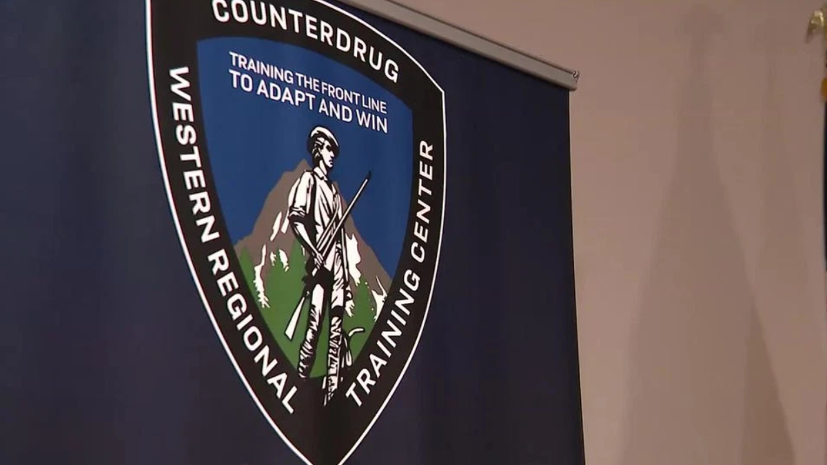 Banner showing the Counterdrug Western Regional Training Center emblem with a front-line worker holding a rifle, mountains in the background, and motto “Training the front line to adapt and win.”