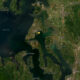 Satellite map of Puget Sound near Port Townsend and Ebey's Landing with a yellow star marking a point of interest near Oak Harbor/Whidbey Island coast