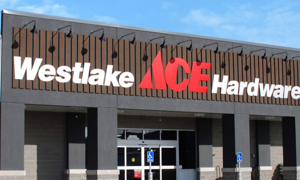 Westlake ACE Hardware storefront with a bold sign against a blue sky, featuring a red ACE logo between white 'Westlake' and 'Hardware' text on a dark facade.