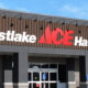 Westlake ACE Hardware storefront with a bold sign against a blue sky, featuring a red ACE logo between white 'Westlake' and 'Hardware' text on a dark facade.