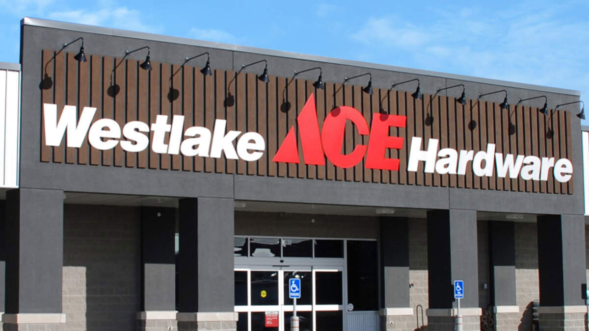 Westlake ACE Hardware storefront with a bold sign against a blue sky, featuring a red ACE logo between white 'Westlake' and 'Hardware' text on a dark facade.