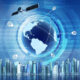 Digital globalization concept with Earth surrounded by network lines and satellites over a futuristic city skyline.
