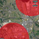 Map showing red circular hazard zones over Renton and Tukwila areas with major highways I-405 and I-5 nearby.