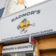 Exterior of Radnor's restaurant with a cartoon burger mascot and bold sign reading 'RADNOR'S'.