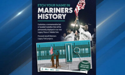 Poster promoting a customizable commemorative bat to etch your name in Mariners History; proceeds support Mariners Legacy Field projects.