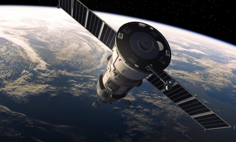 Satellite with large solar panels orbiting Earth, curving horizon and atmosphere visible below
