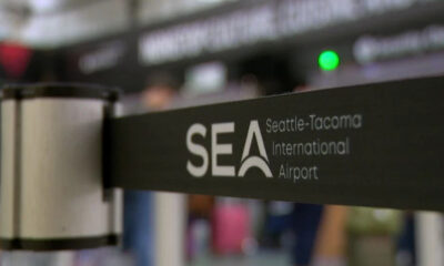 Barrier queue barrier with the SEA logo for Seattle-Tacoma International Airport