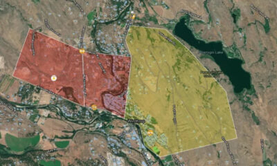 Colored map highlighting red and yellow zones around Winthrop, WA, with roads and Pearrygin Lake nearby.