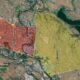 Colored map highlighting red and yellow zones around Winthrop, WA, with roads and Pearrygin Lake nearby.