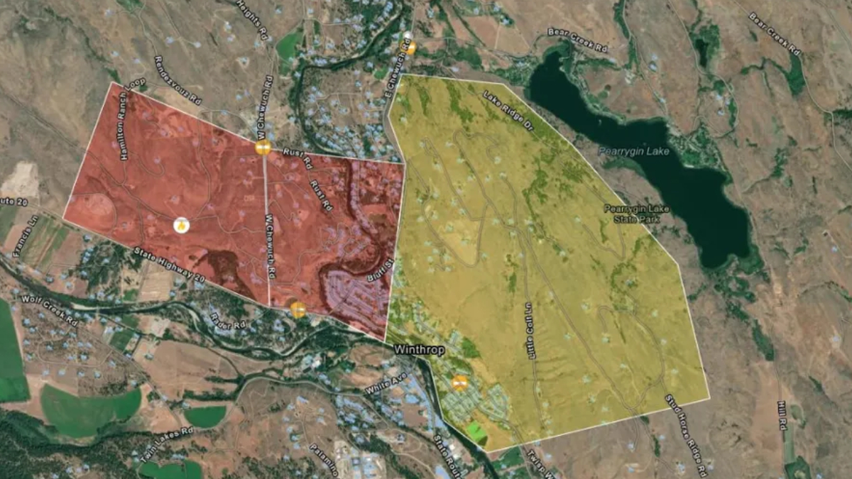 Colored map highlighting red and yellow zones around Winthrop, WA, with roads and Pearrygin Lake nearby.