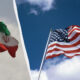 Split image showing the Iranian flag on the left and the American flag on the right, waving in the wind.