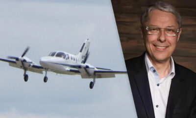 Twin-engine propeller airplane in flight on the left, beside a smiling man in a suit on the right with a diagonal split background.